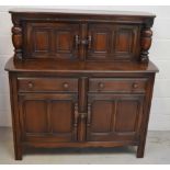 An Ercol oak country-style buffet sideboard,