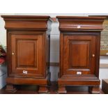 A pair of Bridget Forester mahogany bedside cabinets, moulded top over over moulded door,