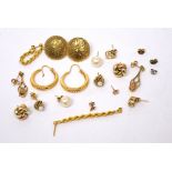 A quantity of 9ct and yellow metal stud, hoop and drop earrings, approx combined 17g.