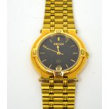 Gucci; a gentlemen's gold plated wristwatch,