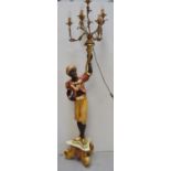 A reproduction figural blackamoor lamp with seven gilt metal electrollier branches, height 191cm.