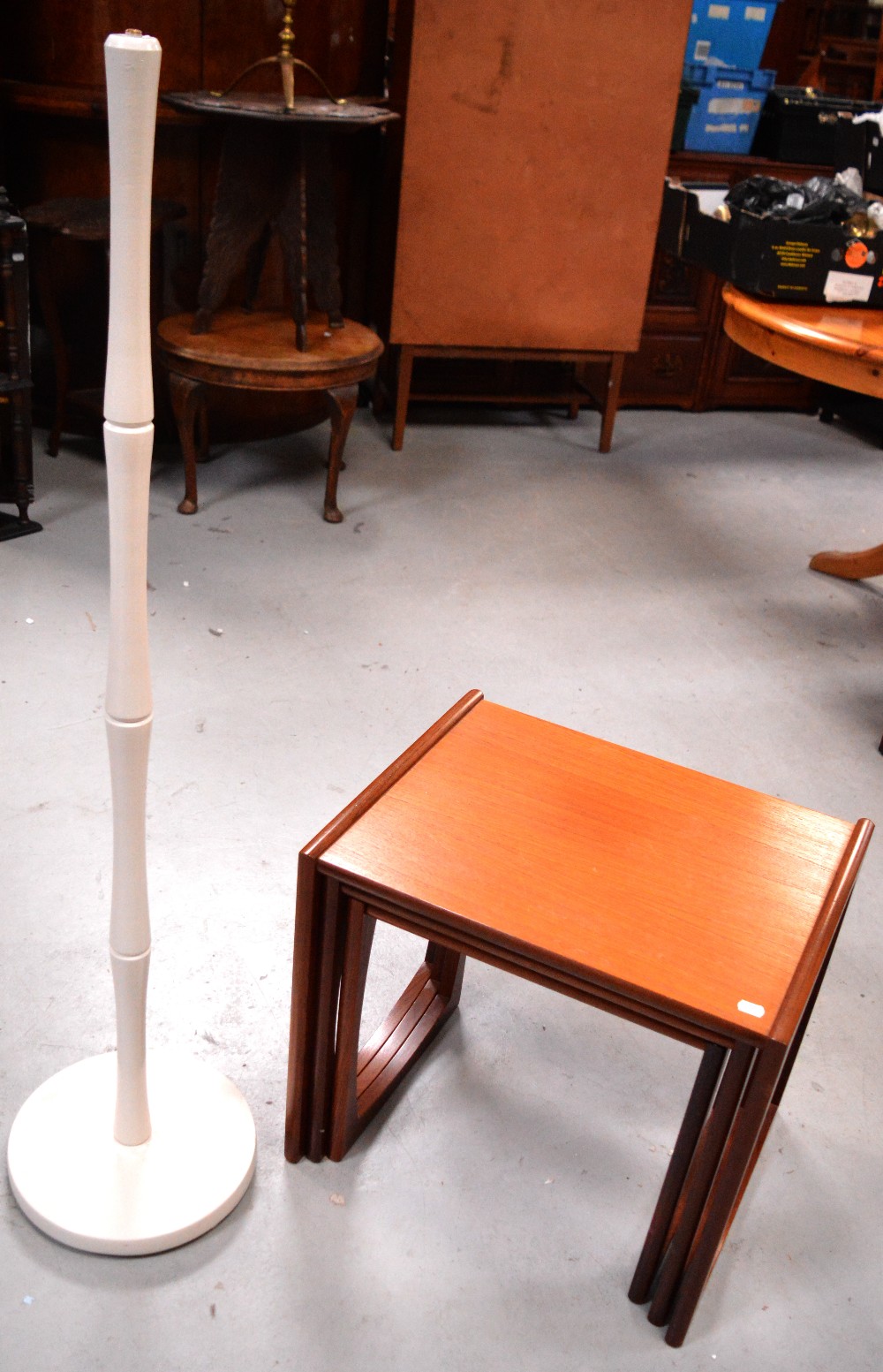 A G-plan teak nest of tables and a white-painted bamboo-style standard lamp, height 125cm (2).