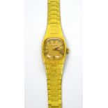 Longines; a c1960s ladies' wristwatch, gold-filled case and integral band with stainless steel back,