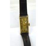 Elgin; a 1937 gentlemen's Art Deco tank-style wristwatch, gold-filled and stainless steel case,