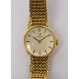 Omega; a 9ct gold Omega Deville ladies' wristwatch with a 9ct gold mesh strap,