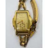 Bulova; a 1937 gentlemen's 'American Clipper' wristwatch, gold-filled tonneau shaped case,