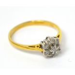 An 18ct yellow gold diamond-set cluster ring, size K 1/2, approx 2.9g.