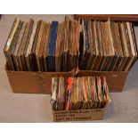 A quantity of LPs and singles to include Conway Twitty, Hank Williams, Elvis, Johnny Tillotson etc.