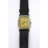 Elgin; a gentlemen's 1937 tank-style wristwatch, stainless steel stepped rectangular case,