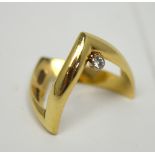 A 9ct yellow gold wishbone ring with collet-set diamond, size Q, approx 4.4g.