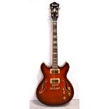 An Ibanez Artcore Series AS93-VLS-12-02 semi-acoustic guitar,