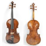 A full size Czechoslovakian Amati copy violin with label, the two-piece back 35.8cm.