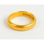 A 22ct yellow gold D-shaped wedding band, size L, approx 5.5g.