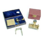 A small collection of cloth makers instruments comprising a cased brass thread counter microscope
