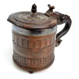 A rare 17th century lignum vitae York tankard, the hinged lid with acorn finial,