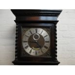 PRESTONS LTD OF BOLTON; a 1920s oak longcase clock, the square dial set with silvered chapter ring,