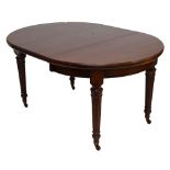 A mahogany D-end dining table with three extending leaves with tapering fluted legs to peg feet to