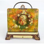 A Victorian photo album on wooden gilt metal decorated stand,
