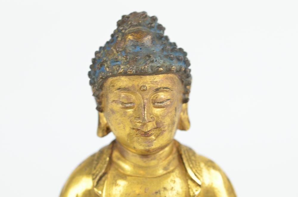 A Chinese late Ming period gilt bronze figure of seated Buddha Amitabha, - Image 4 of 5