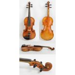 A full size German violin, unlabelled, the two-piece back 39.5cm, cased with two bows.