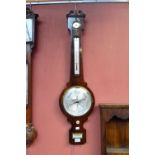 A 19th century rosewood wheel barometer by WM Lombardini of Huddersfield, height 100cm.