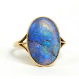 An 18ct yellow gold and oval opal dress ring, size M 1/2 (af).