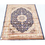 A blue ground Keshan carpet, 280 x 200cm.