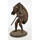 An early 20th century bronze figure of a boy with scythe and carrying bundle of hay on his back,