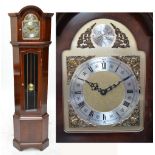 A reproduction longcase corner clock with arched top, brushed chapter ring bearing Roman numerals,