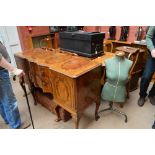 A reproduction walnut dining room suite comprising table, six chairs and a sideboard (8).