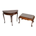 A Waring & Gillow mahogany coffee table with shaped apron,