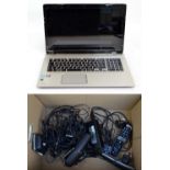 A Toshiba 'Satellite' laptop with power adapter,