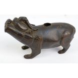 A Chinese Ming period bronze water dropper modelled as a mythological dog, unmarked, length 15cm.