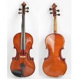 A three-quarter size violin, unlabelled, the two-piece back 33.8cm.