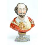 A 19th century pearlware bust of Shakespeare, unmarked, height 23cm.