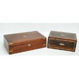 A late 19th century rosewood brass bound writing slope with inkwell and pen tray to the interior,