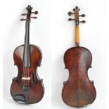 A full size German violin, Stradivarius copy with label, the two-piece back 35.9cm.