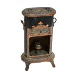 A 19th century vintage petrolux stove with stained glass canopy and floral detail to the metal