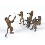 An early 20th century Austrian cold painted bronze six piece orchestra of three monkeys and three