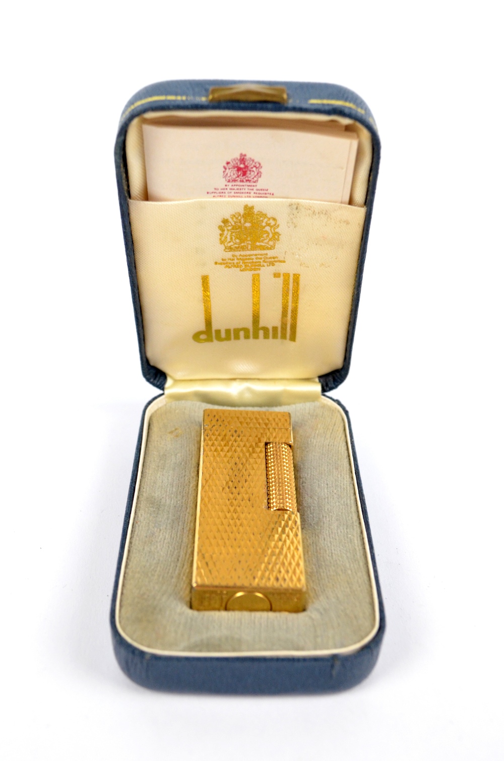 A boxed gold plated textured Dunhill Rollagas lighter, RE24163, with manual.