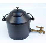 A cast iron Swain two gallon kettle with brass tap.