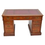 A late 19th century walnut nine drawer twin pedestal desk, width 121.5cm.