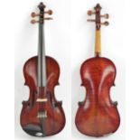 A three-quarter size violin, unlabelled, the two-piece back 33.6cm.