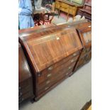 An early 19th century mahogany bureau,