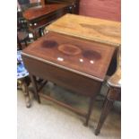 An Edwardian rosewood and line inlaid drop leaf occasional table with single frieze drawer,