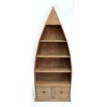 A boat shaped open bookcase with four shelves above two drawers, height 205cm.