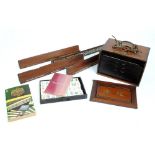 A boxed Mahjong set with five drawers, a set of four wooden and bone inlaid tile stands,