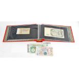 A collection of British and world bank notes, including Isle of Man, Scotland, Ireland, Caymens,