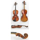 A three quarter size German violin, unlabelled, the two-piece back 34cm.