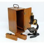 An early 20th century Bausch & Lomb of Rochester, New York monocular microscope patented 1915,